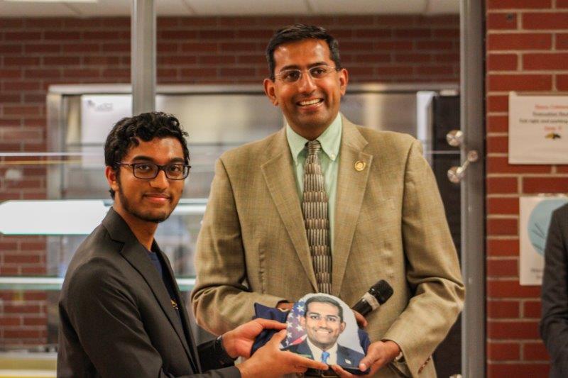 2 people are pictured; Haresh Muralidharan, the camp organizer, and Arvind, a state representative.