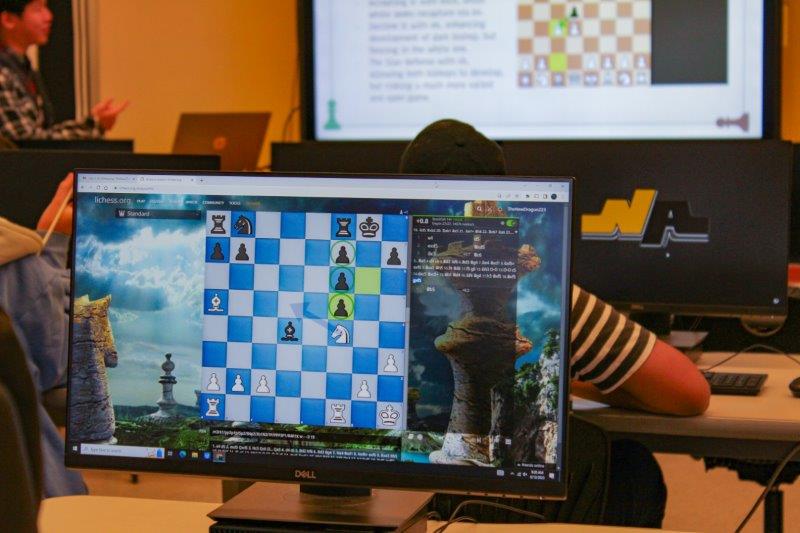 a chess game on a computer screen is pictured